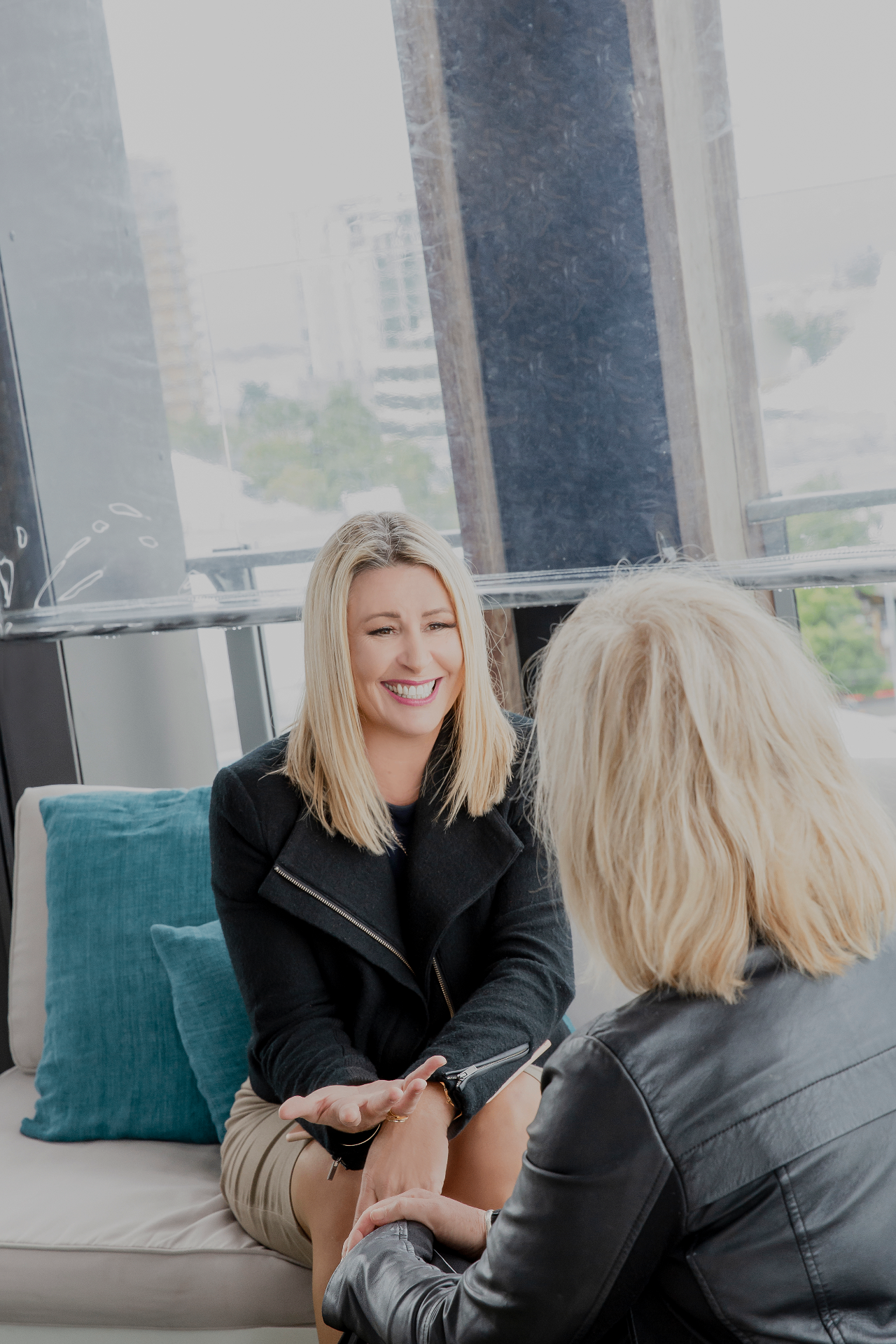 Joannah Bernard in conversation with a client